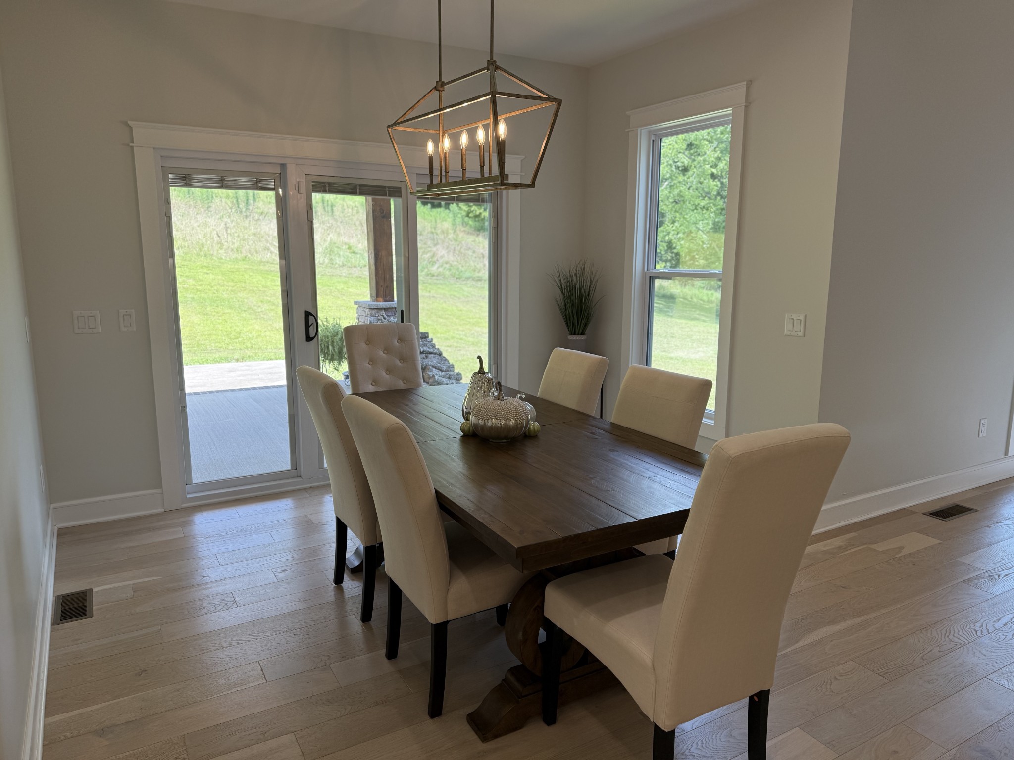 2145 Honey Prong Road Hartsville, TN 37074 - Photo 20 of 99 a view of a dining room with furniture window and wooden floor