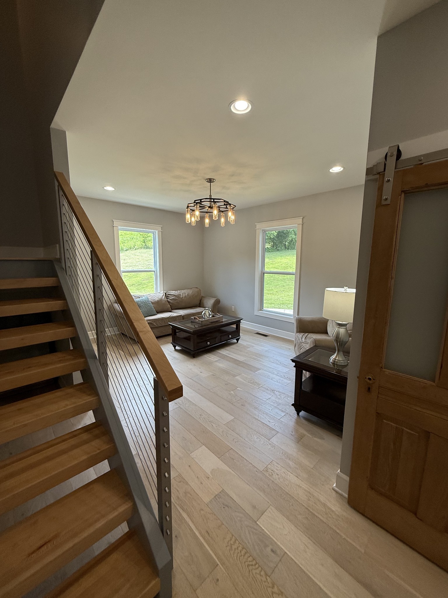 2145 Honey Prong Road Hartsville, TN 37074 - Photo 28 of 99 a living room with furniture and a wooden floor