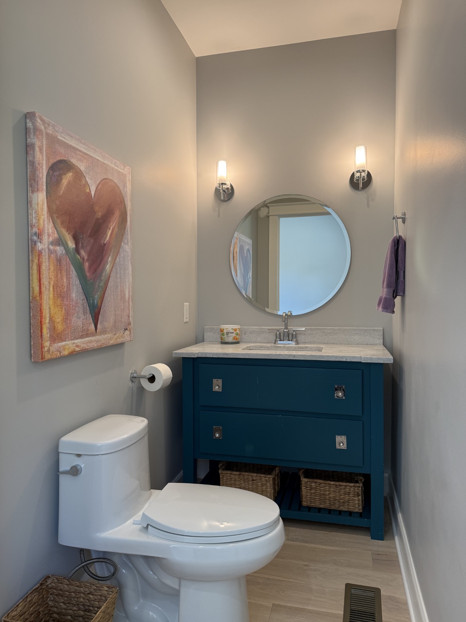 2145 Honey Prong Road Hartsville, TN 37074 - Photo 31 of 99 a bathroom with a toilet a sink and mirror