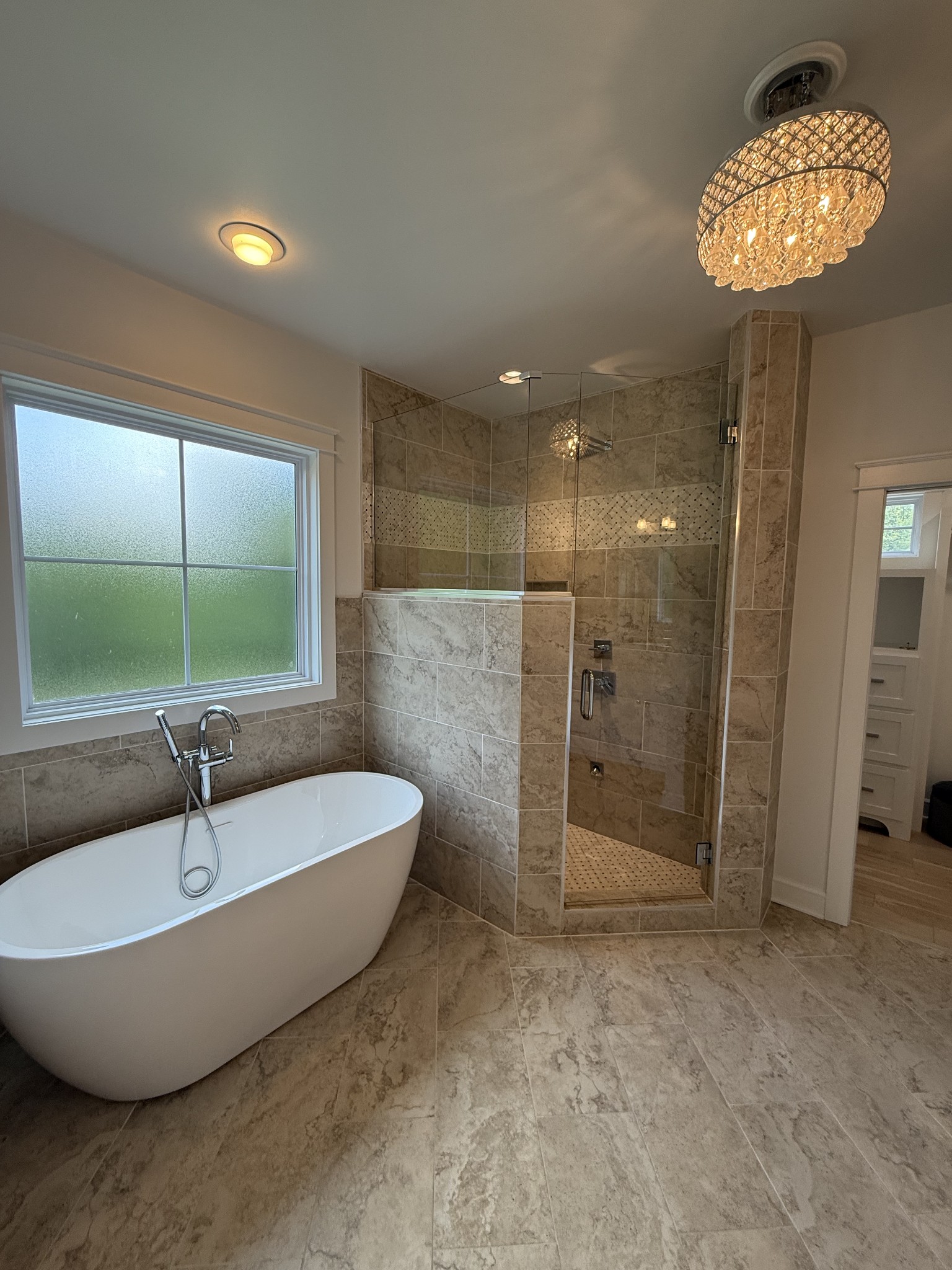 2145 Honey Prong Road Hartsville, TN 37074 - Photo 35 of 99 a bathroom with a tub and a shower