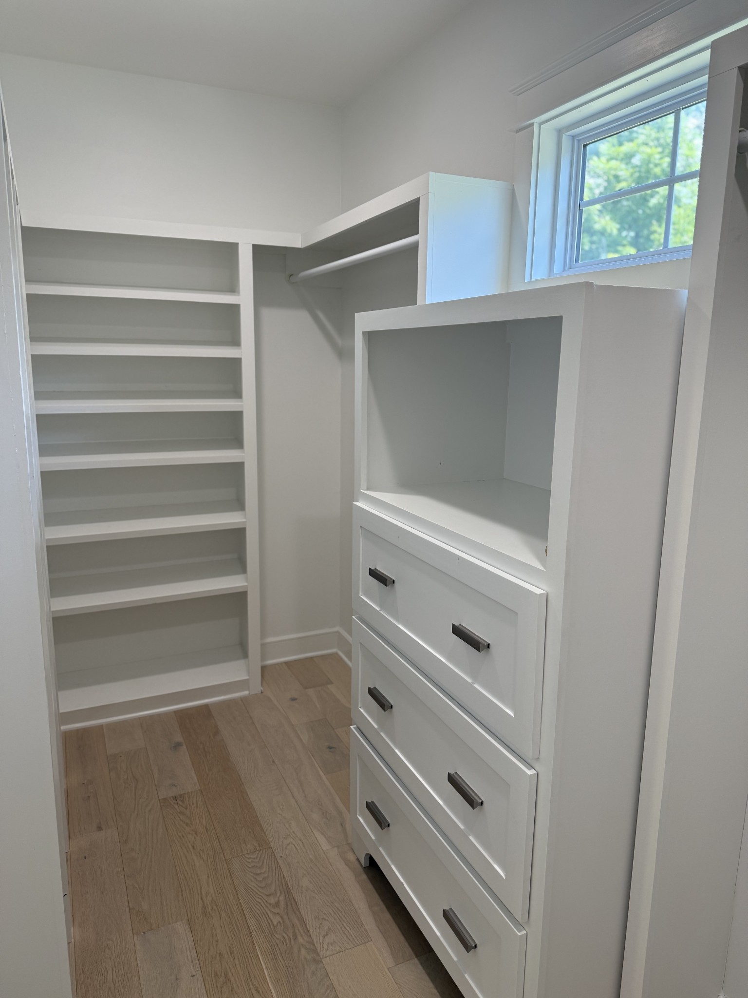 2145 Honey Prong Road Hartsville, TN 37074 - Photo 41 of 99 a view of walk in closet with empty racks
