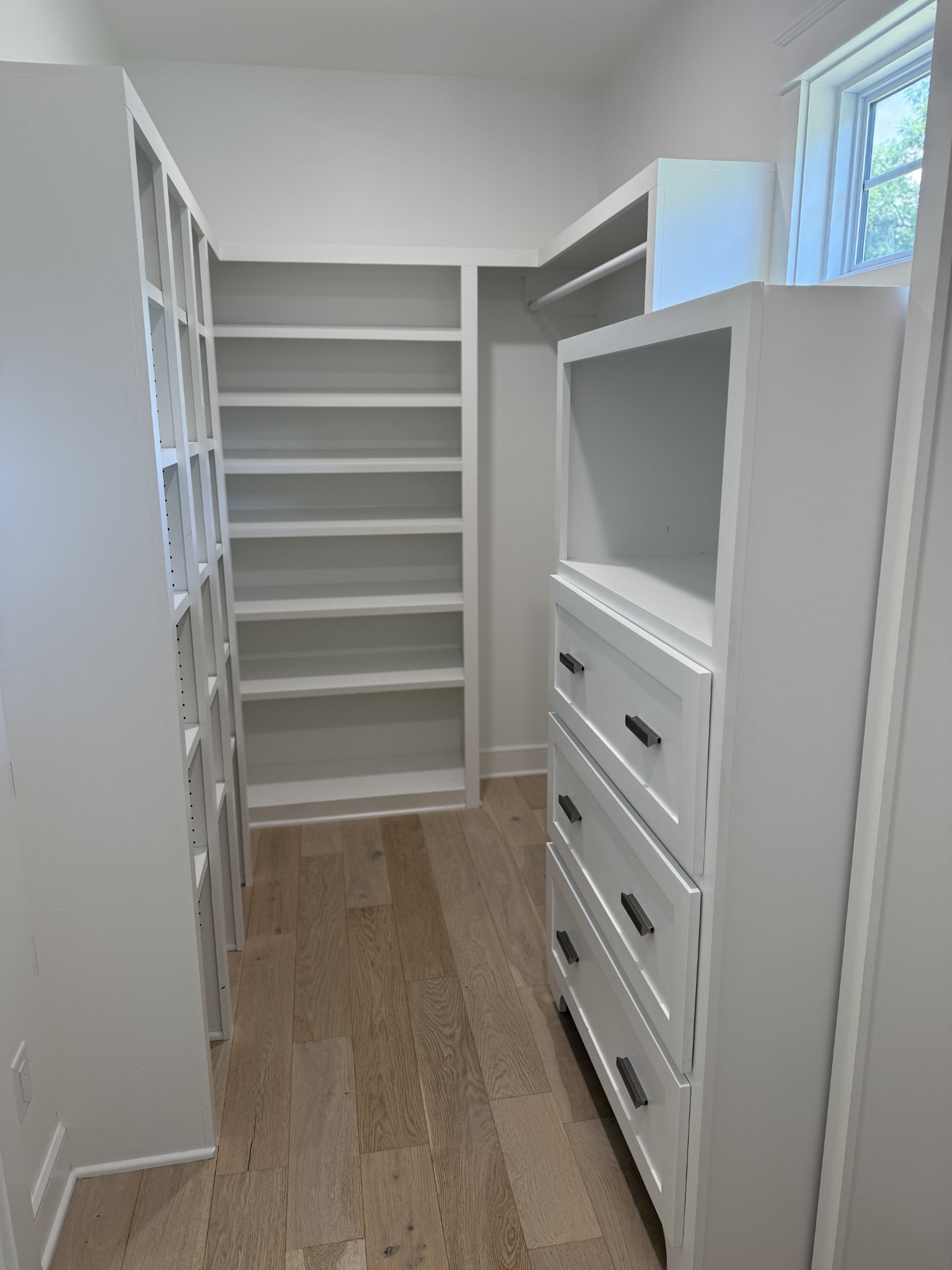 2145 Honey Prong Road Hartsville, TN 37074 - Photo 43 of 99 a view of walk in closet with empty racks