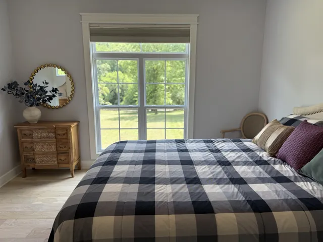 a view of a yard with a tree