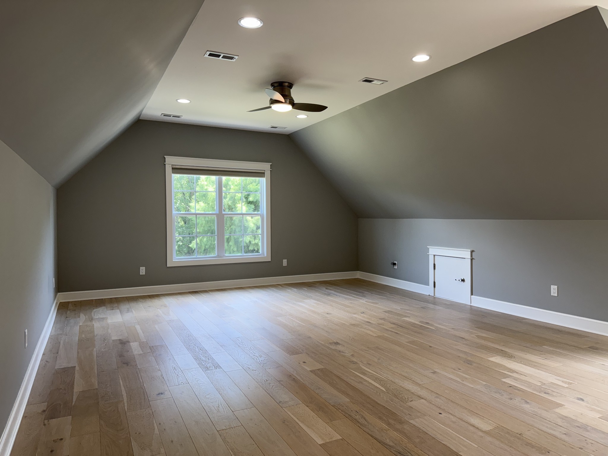 2145 Honey Prong Road Hartsville, TN 37074 - Photo 56 of 99 an empty room with wooden floor and windows