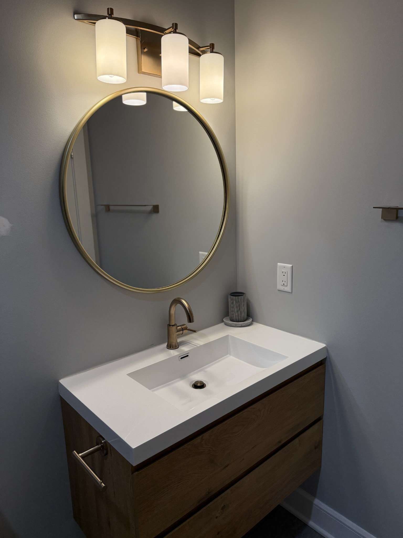 2145 Honey Prong Road Hartsville, TN 37074 - Photo 58 of 99 a bathroom with a sink a vanity and a mirror