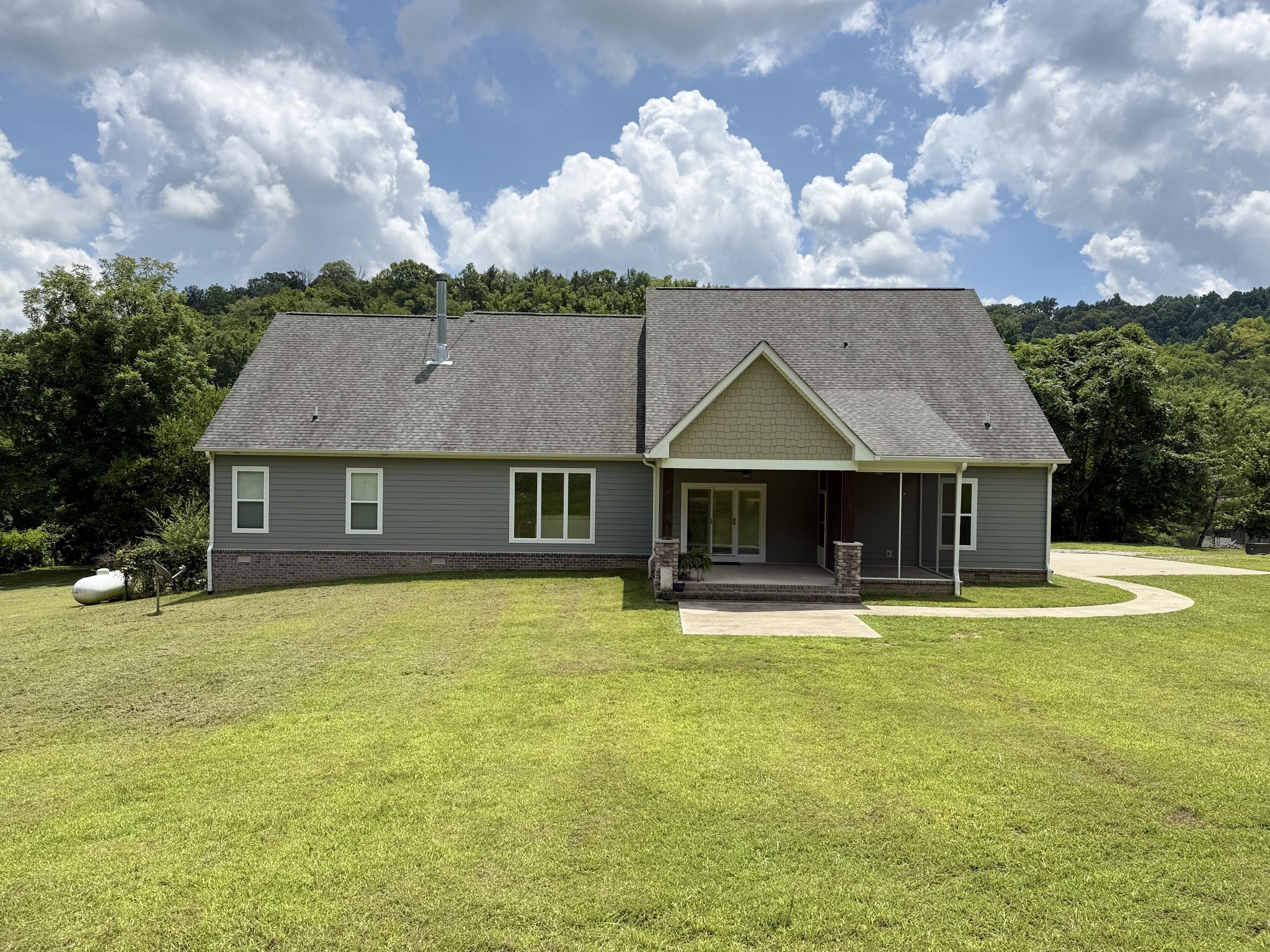 2145 Honey Prong Road Hartsville, TN 37074 - Photo 70 of 99 a front view of a house with a garden