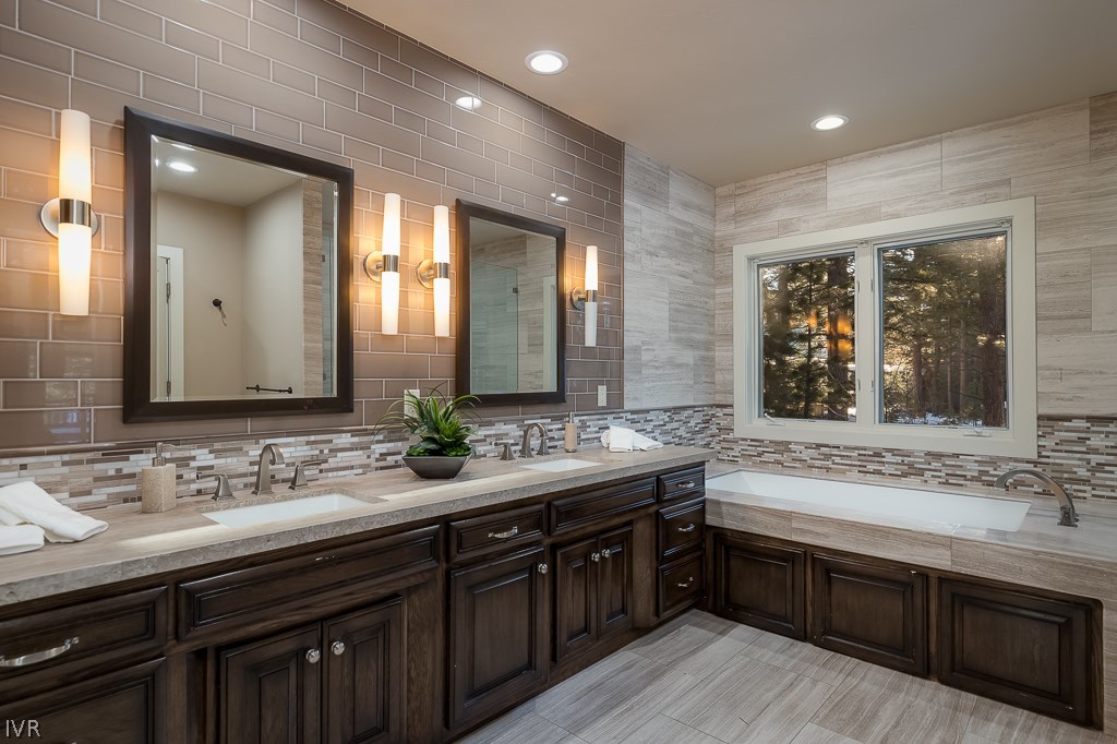 818 Ophir Peak Road Incline Village, NV 89451 - Photo 12 of 23 a bathroom with a double vanity sink and a mirror