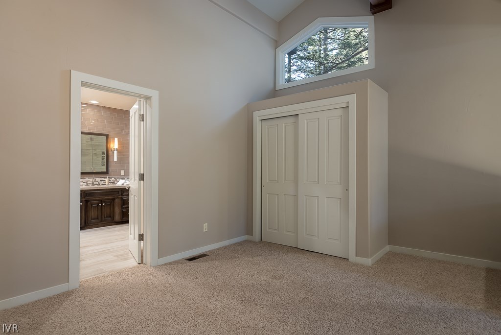 818 Ophir Peak Road Incline Village, NV 89451 - Photo 15 of 23 an empty room with windows and closet