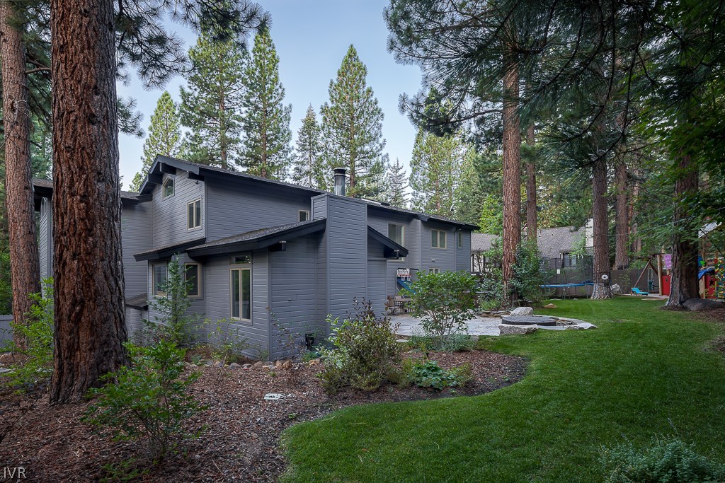 818 Ophir Peak Road Incline Village, NV 89451 - Photo 2 of 23 a backyard of a house with lots of green space