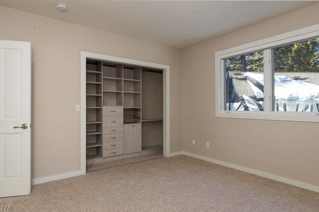 818 Ophir Peak Road Incline Village, NV 89451 - Photo 22 of 23 an empty room with a window and closet