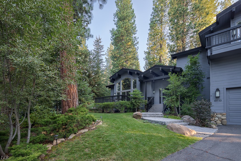 818 Ophir Peak Road Incline Village, NV 89451 - Photo 3 of 23 a view of a house with a yard and plants