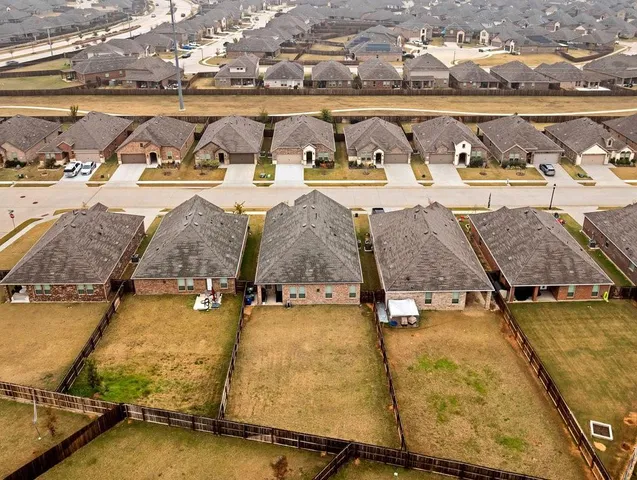 a tall building with view of the ocean