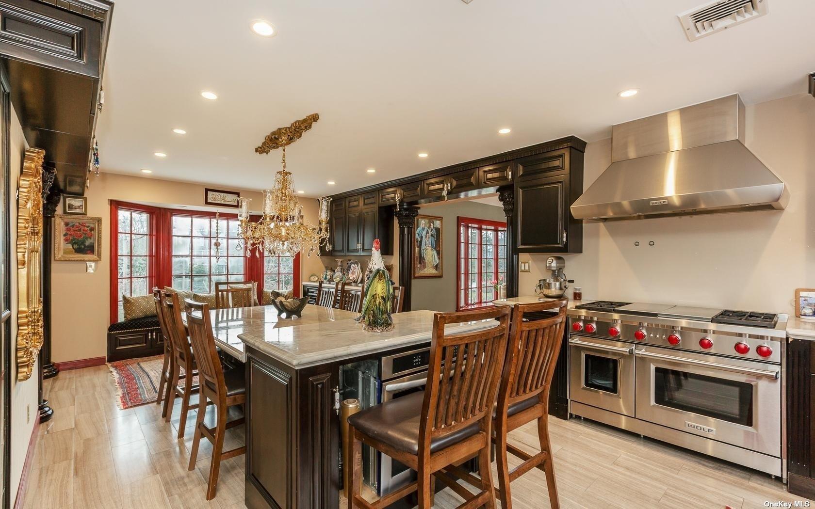 7 Old Field Road Setauket, NY 11733 - Photo 16 of 33 a view of a dining room with furniture and wooden floor