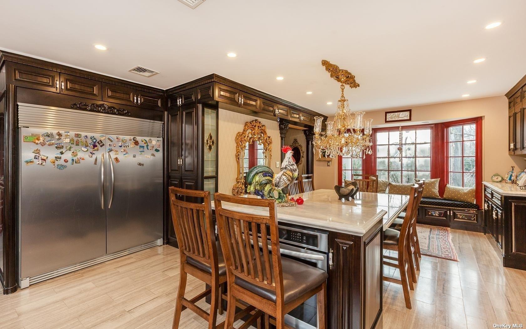7 Old Field Road Setauket, NY 11733 - Photo 17 of 33 a view of a dining room with furniture window and wooden floor