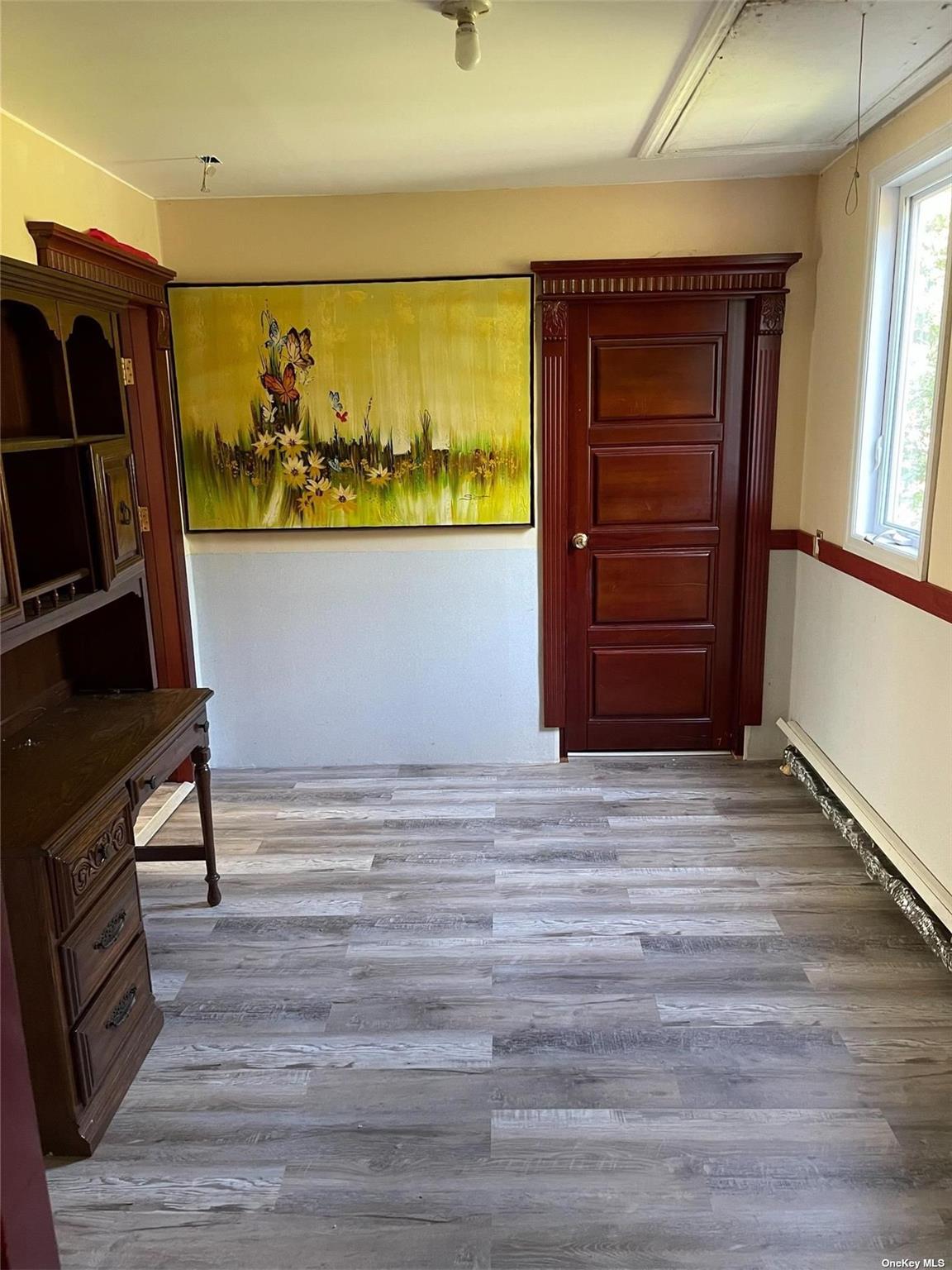 7 Old Field Road Setauket, NY 11733 - Photo 26 of 33 a view of walk in closet with clothes and shoes