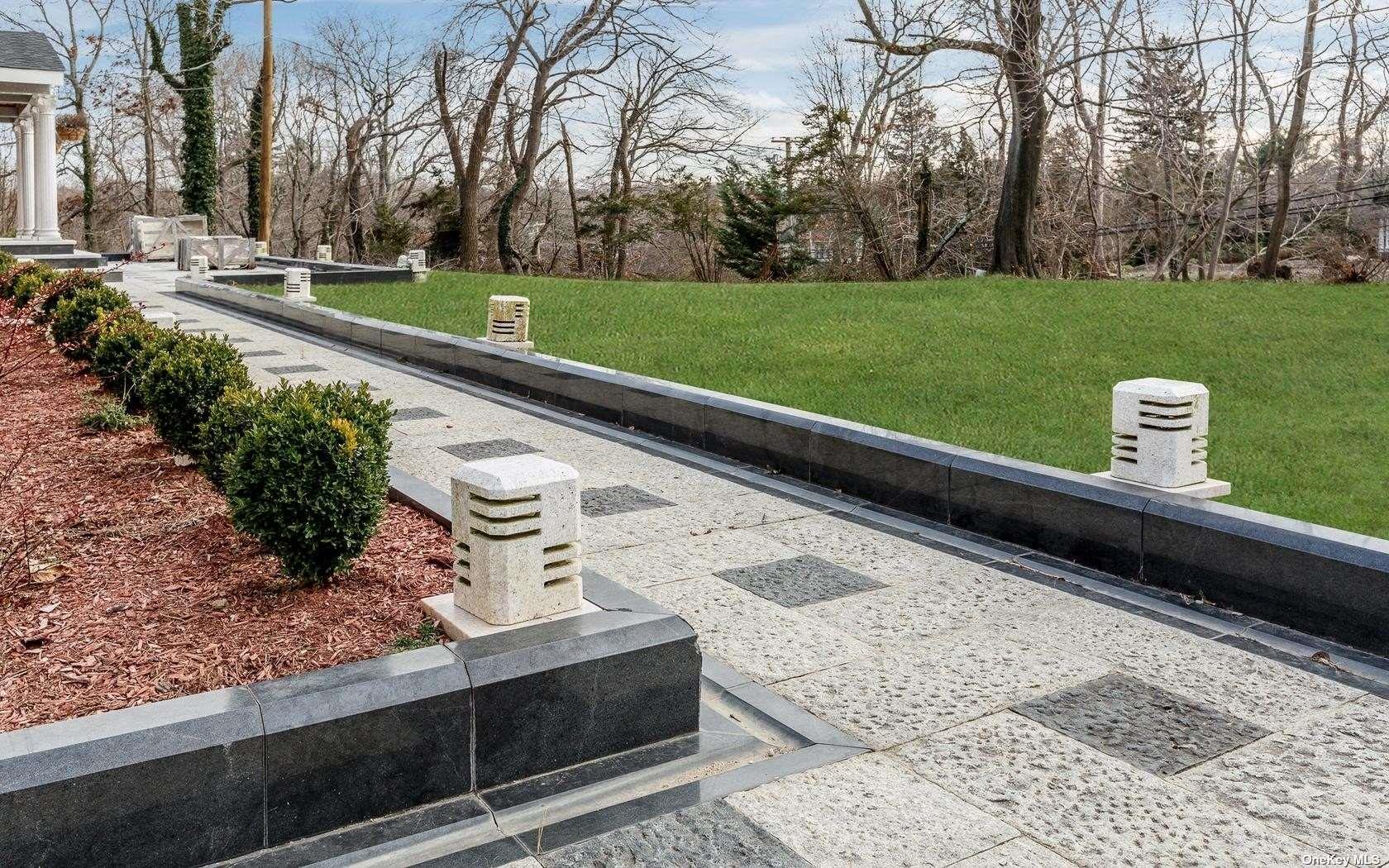 7 Old Field Road Setauket, NY 11733 - Photo 3 of 33 a view of a garden with an outdoor space