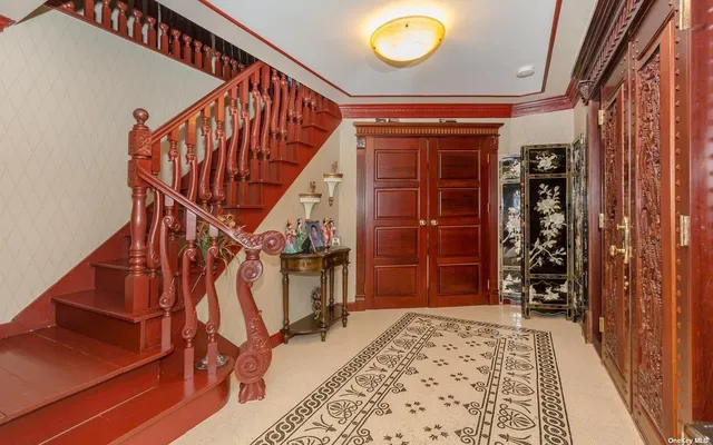a view of an entryway with a front door
