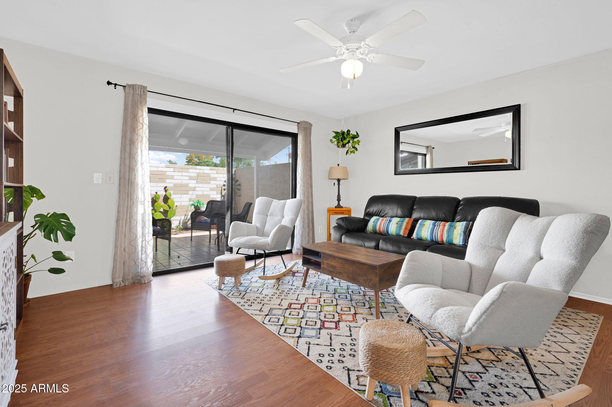 5315 North 18th Street, Unit 9 Phoenix, AZ 85016 - Photo 11 of 27 a living room with furniture and a large window