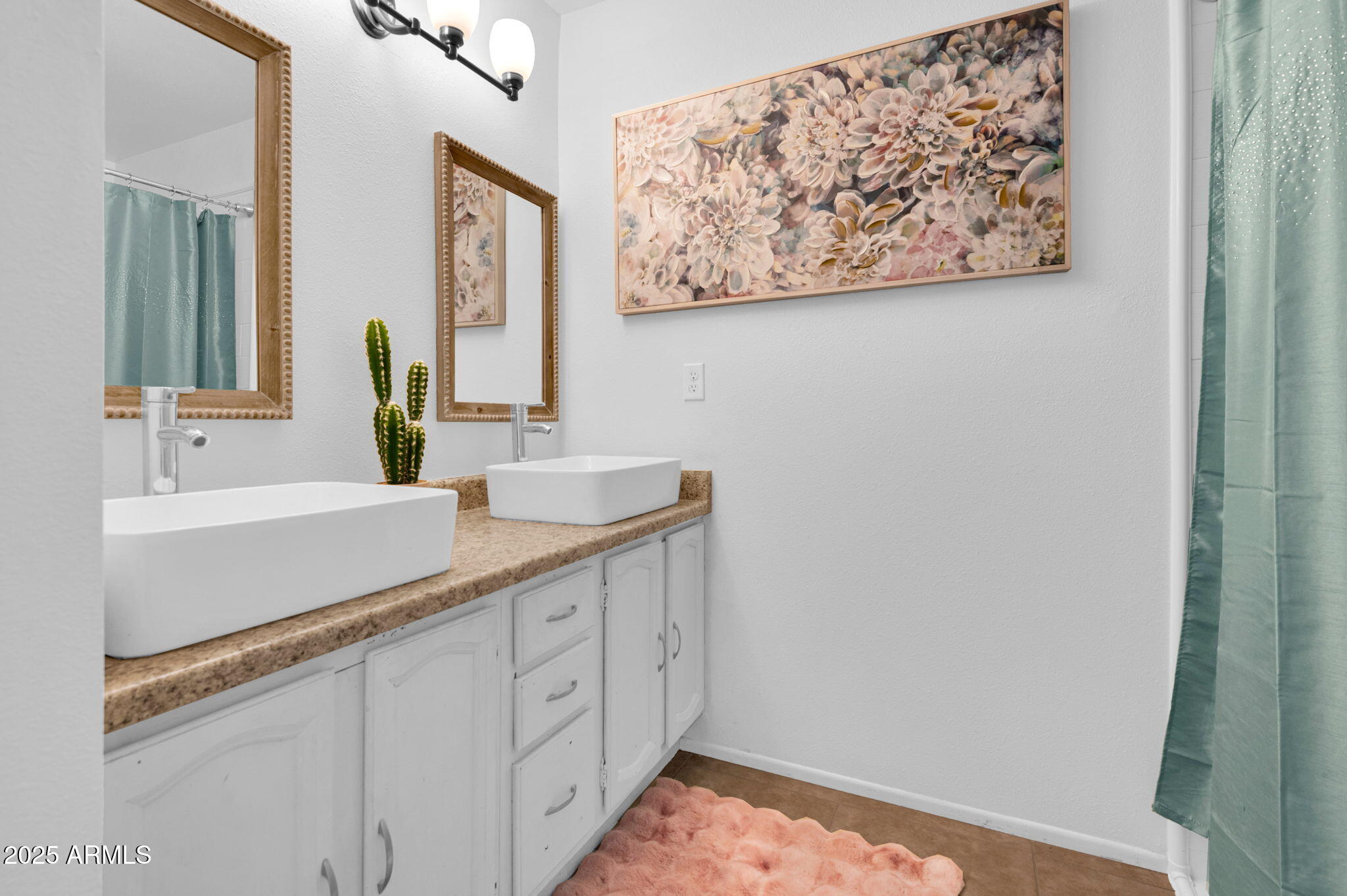 5315 North 18th Street, Unit 9 Phoenix, AZ 85016 - Photo 14 of 27 a bathroom with a sink and a mirror