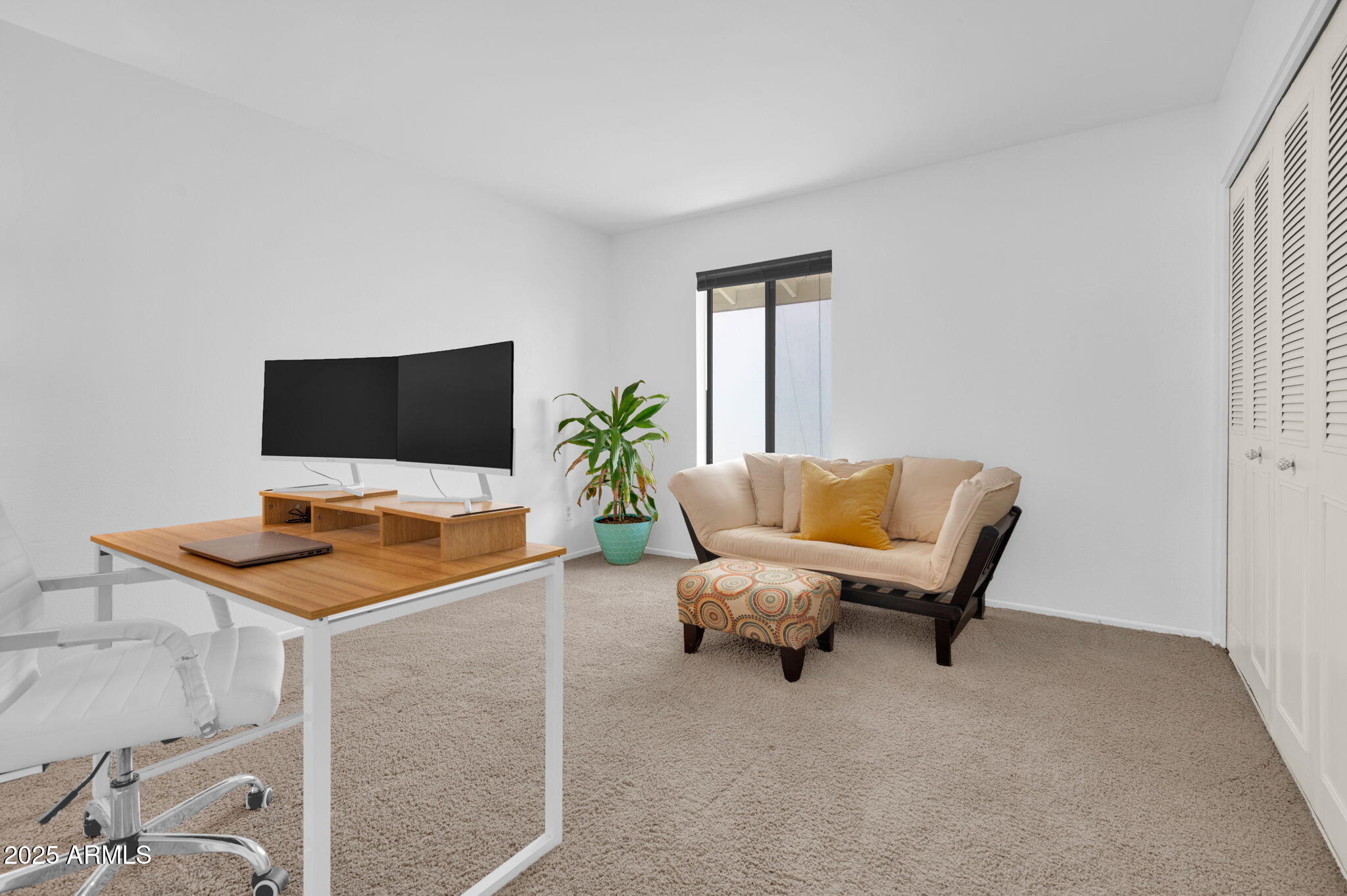 5315 North 18th Street, Unit 9 Phoenix, AZ 85016 - Photo 15 of 27 a living room with furniture and a flat screen tv