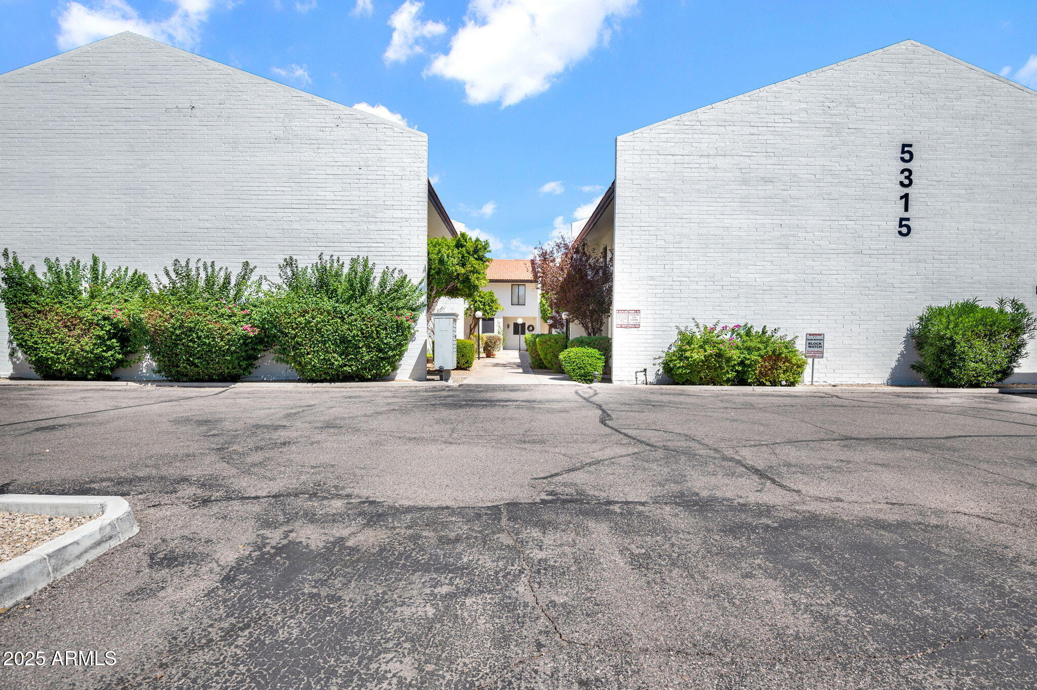 5315 North 18th Street, Unit 9 Phoenix, AZ 85016 - Photo 19 of 27 a view of a building with potted plants