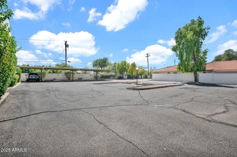 a view of a table and chairs in the patio