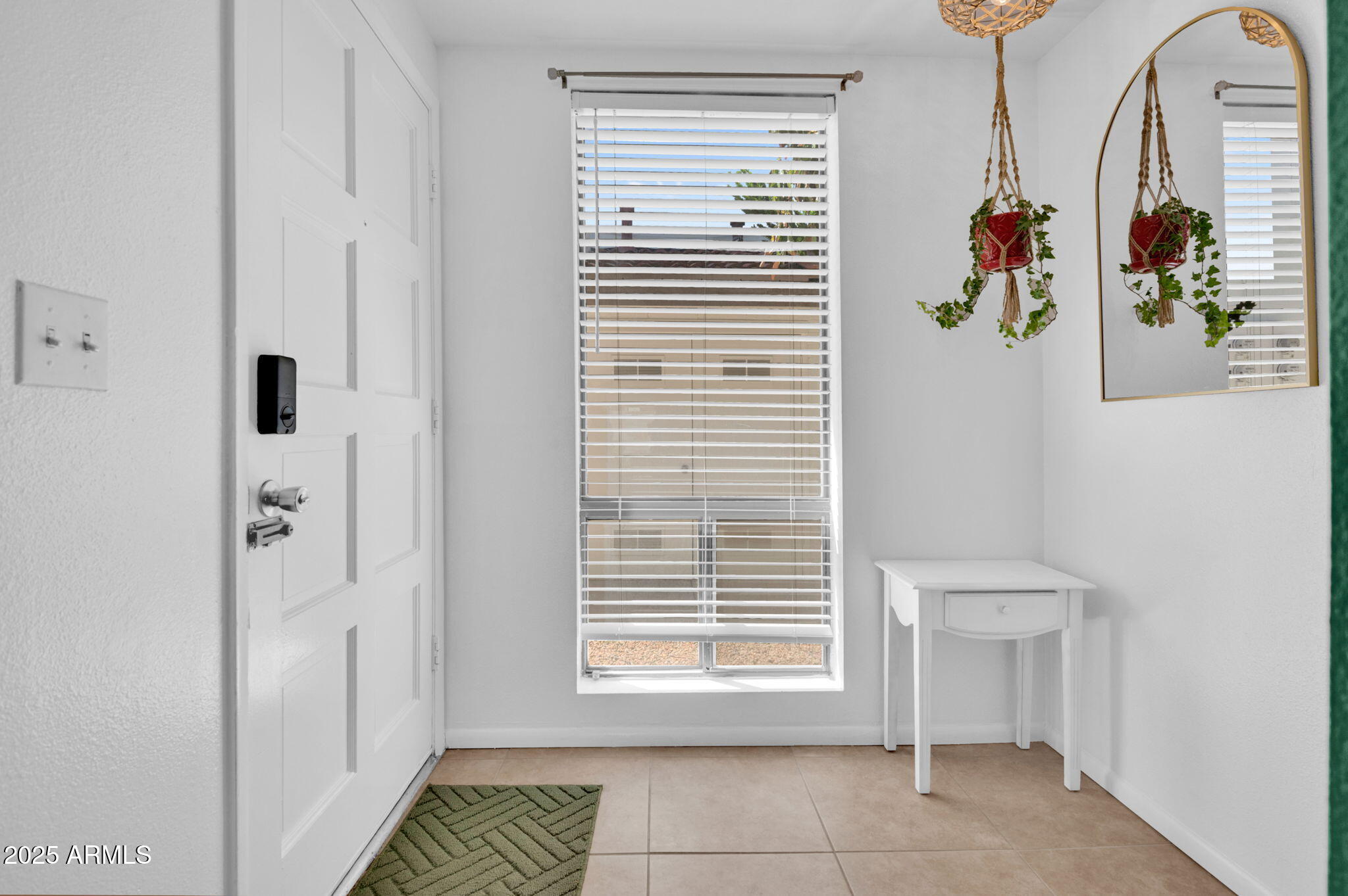 5315 North 18th Street, Unit 9 Phoenix, AZ 85016 - Photo 4 of 27 a view of an entryway with wooden floor