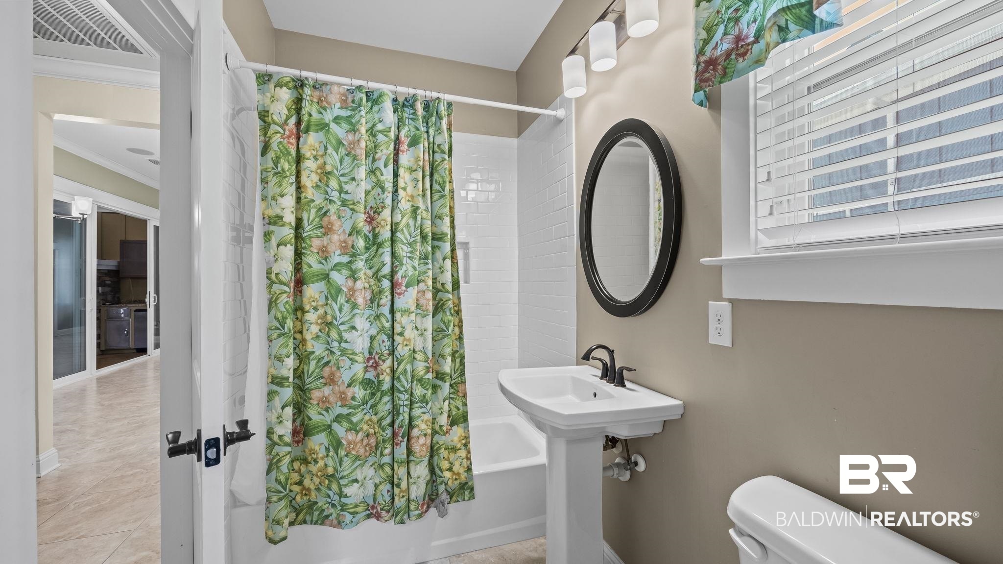 12361 Reunion Place Foley, AL 36535 - Photo 22 of 43 Full bath featuring shower / tub combo and toilet