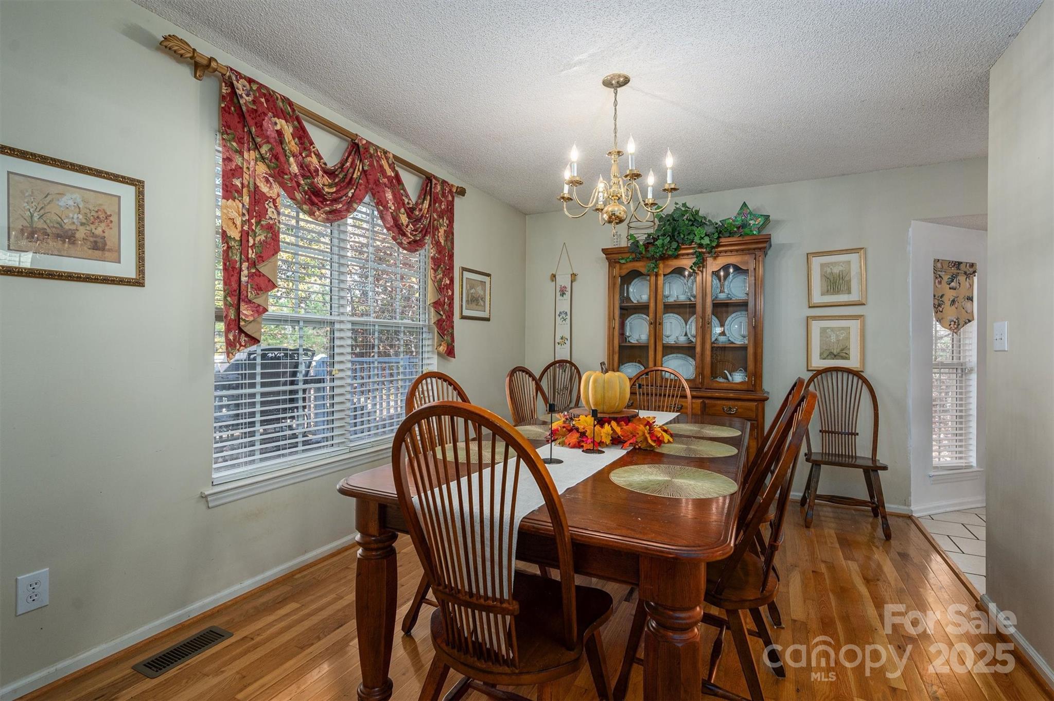1335 Huckleberry Road Lincolnton, NC 28092 - Photo 11 of 24 a view of a dining room with furniture window and wooden floor