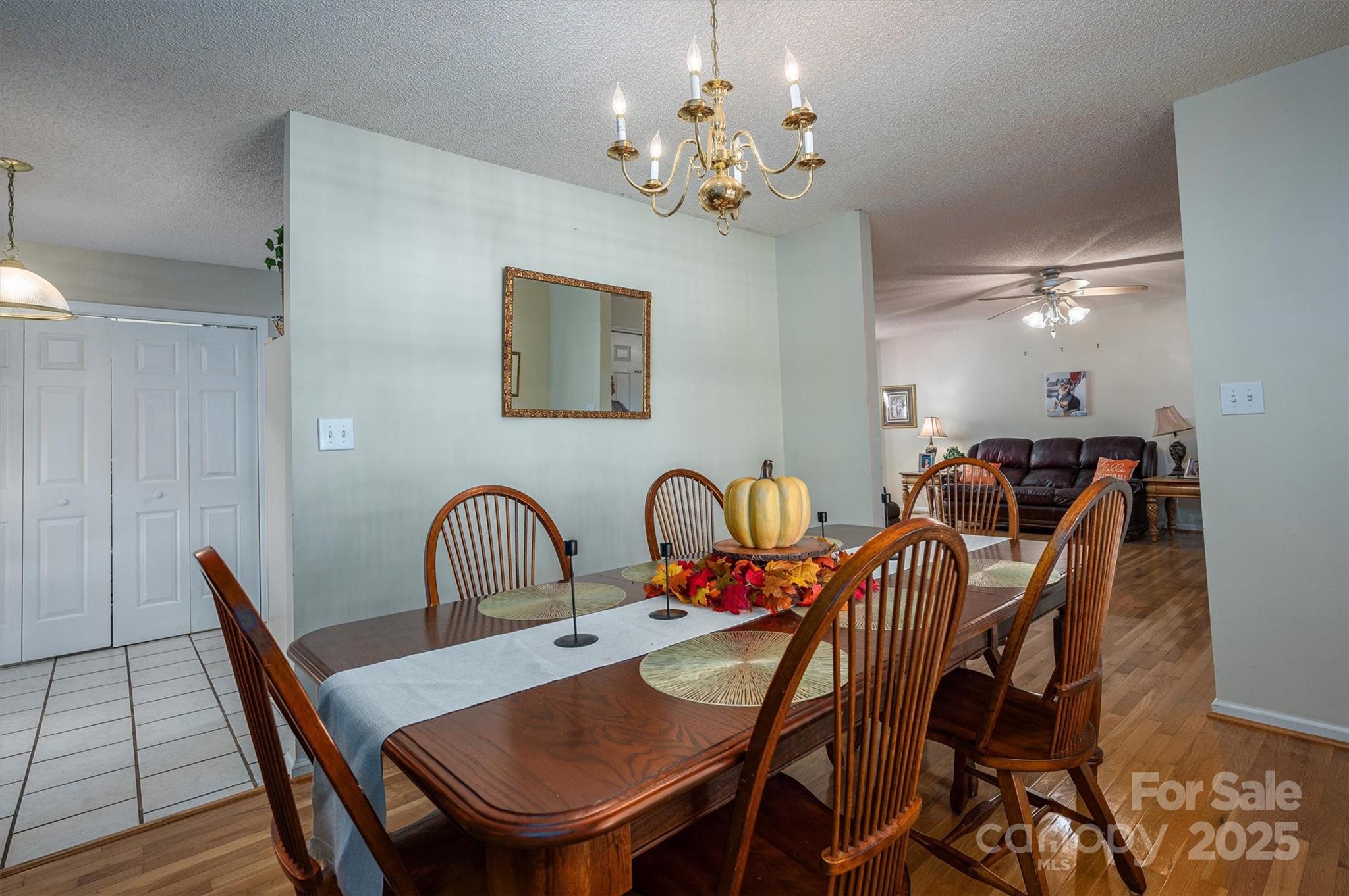 1335 Huckleberry Road Lincolnton, NC 28092 - Photo 12 of 24 a view of a dining room with furniture and chandelier