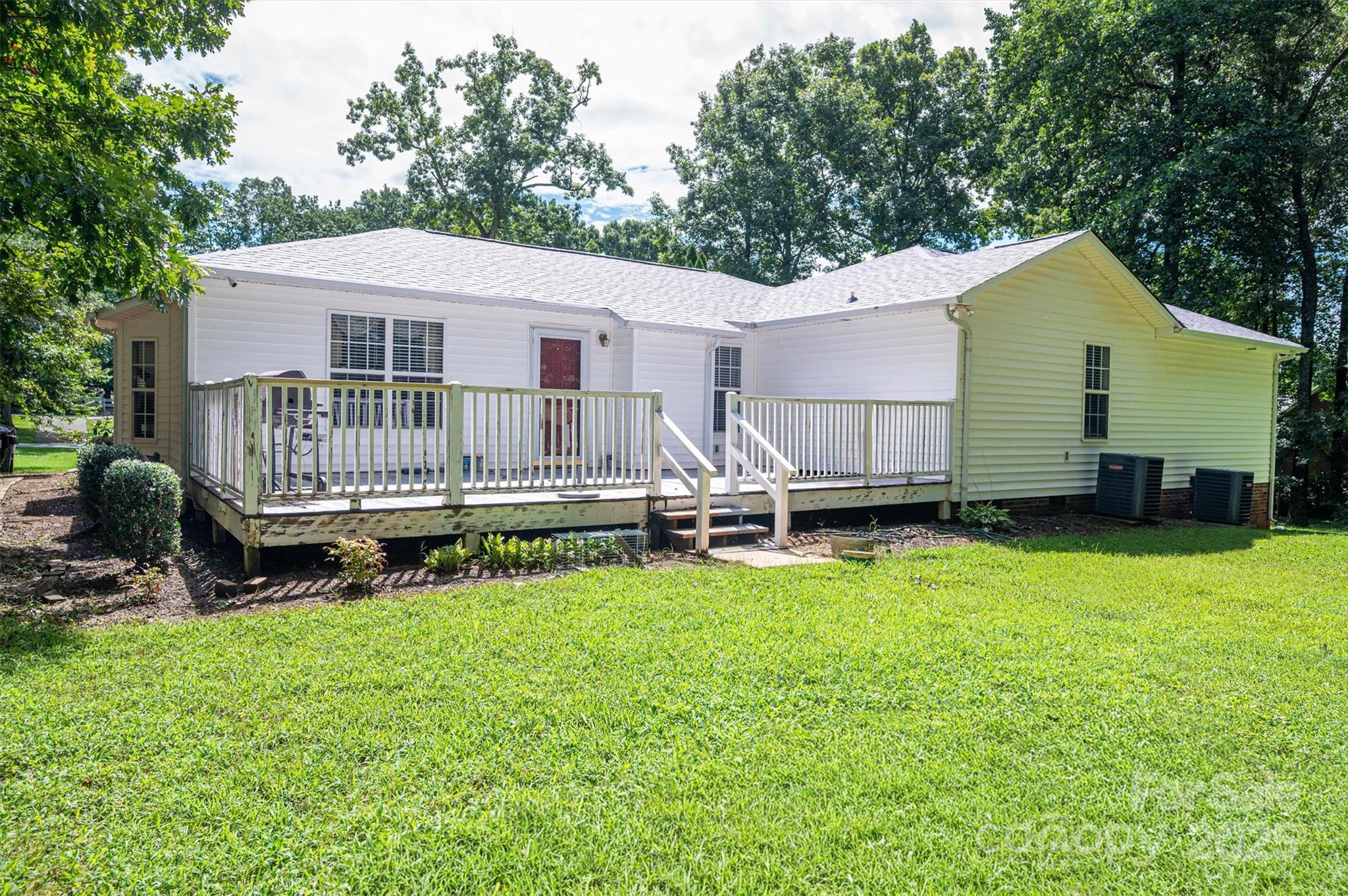 1335 Huckleberry Road Lincolnton, NC 28092 - Photo 23 of 24 a view of a house with a yard patio and a small yard