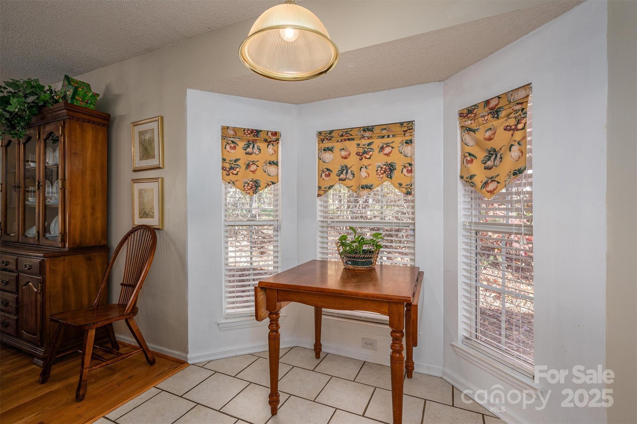 1335 Huckleberry Road Lincolnton, NC 28092 - Photo 9 of 24 a view of a workspace with furniture and a window