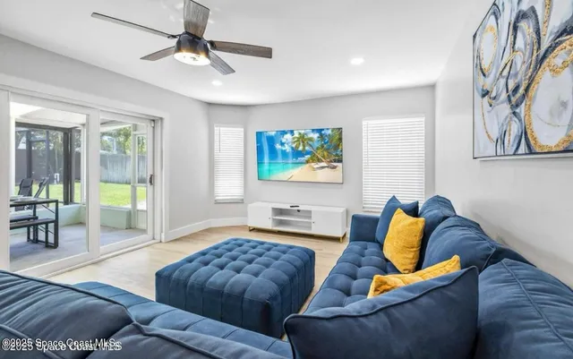 a bedroom with a bed and couch