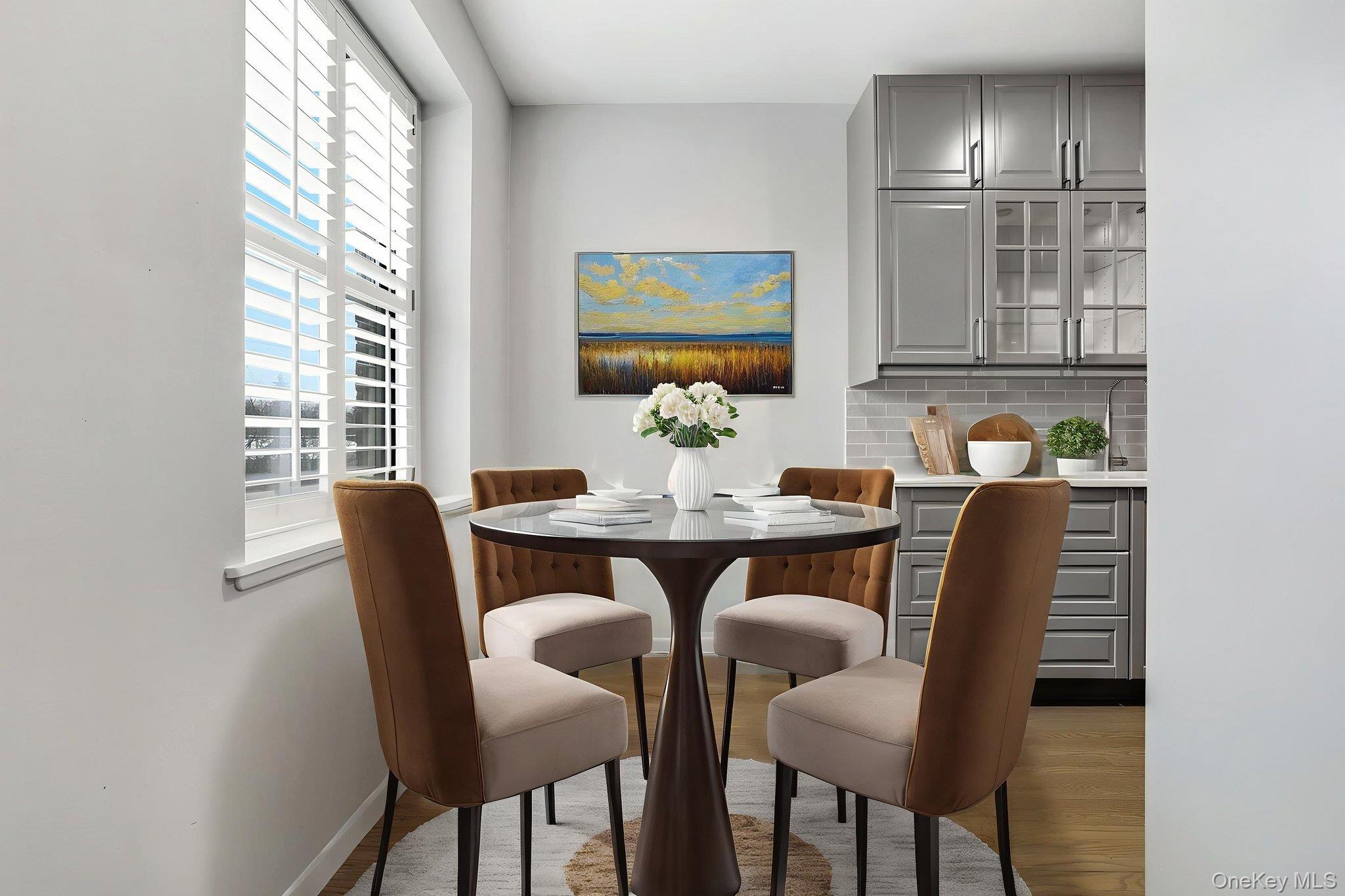 11 Alden Road, Unit 1M Larchmont, NY 10538 - Photo 14 of 25 a dining room with furniture and window