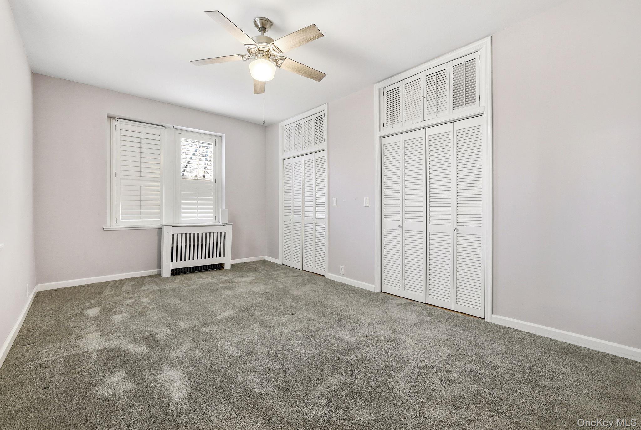 11 Alden Road, Unit 1M Larchmont, NY 10538 - Photo 19 of 25 a view of an empty room with a window