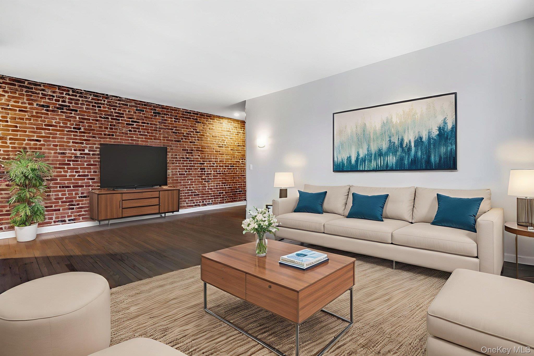 11 Alden Road, Unit 1M Larchmont, NY 10538 - Photo 4 of 25 a living room with furniture a rug and a flat screen tv