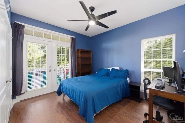 a view of entryway with wooden floor