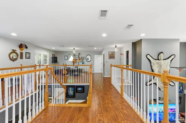 a work room with furniture and a bookshelf
