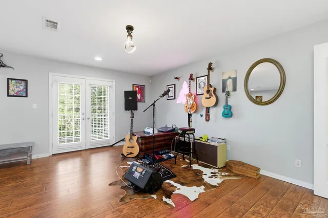 a view of storage and utility room with washer and dryer