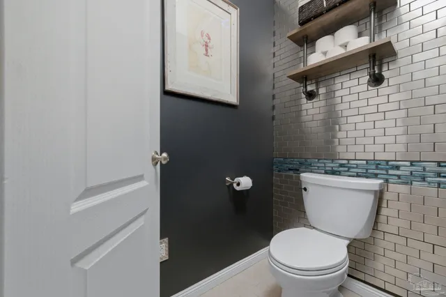 a view of swimming pool from a living room