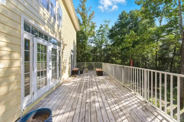 a house view with a seating space and garden view