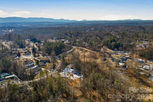 a view of a city with mountain