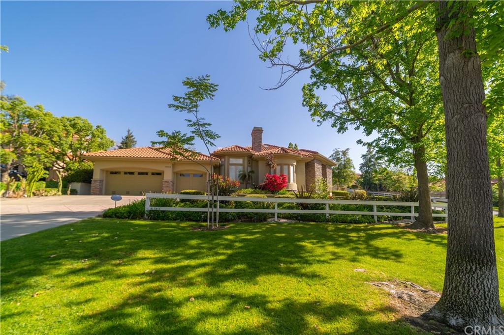 10804 Boulder Canyon Road Rancho Cucamonga, CA 91737 - Photo 1 of 1 a view of a house with a big yard
