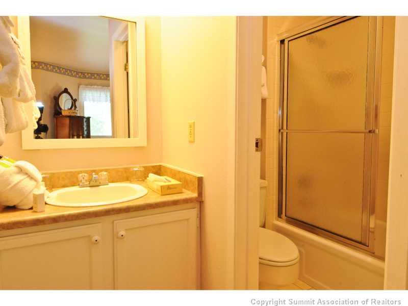 1977 Soda Ridge Road, Unit 1212 Keystone, CO 80435 - Photo 12 of 25 a bathroom with a sink and a mirror