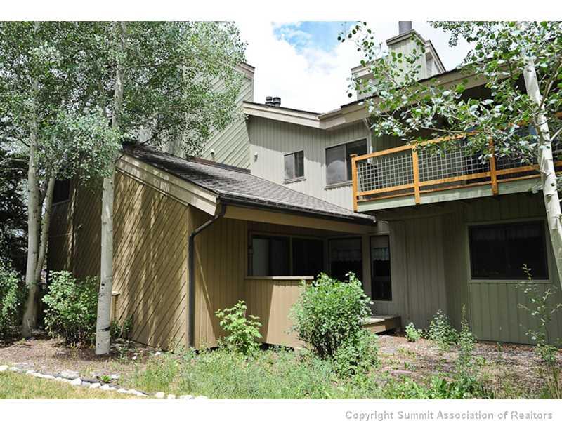1977 Soda Ridge Road, Unit 1212 Keystone, CO 80435 - Photo 20 of 25 a front view of a house with a yard