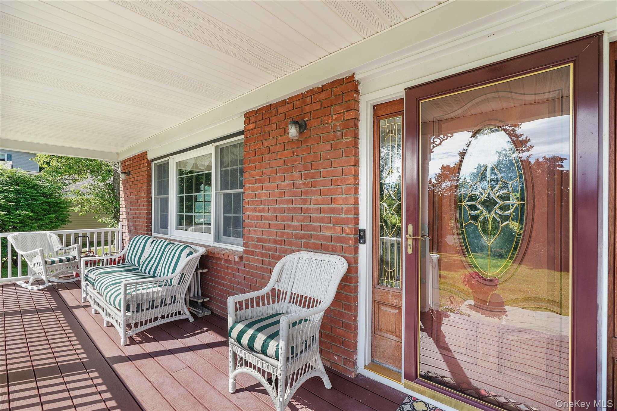 623 Cardinal Road Cortlandt Manor, NY 10567 - Photo 3 of 40 a balcony view with a seating space