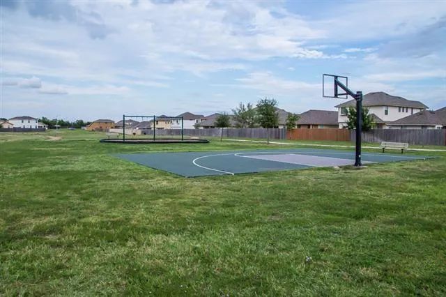 a view of a big yard next to a yard