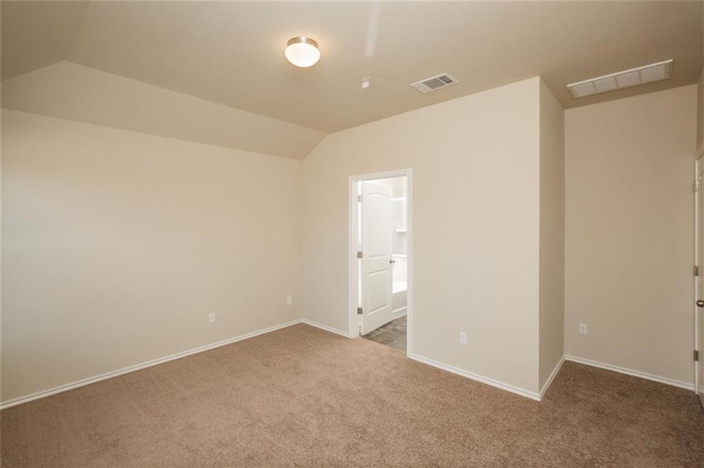 12912 Tinker Street Manor, TX 78653 - Photo 10 of 12 a view of an empty room