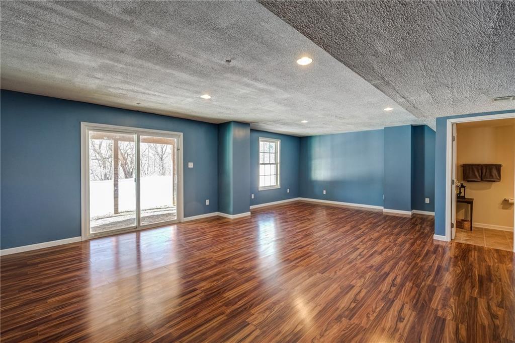 110 Maple Ridge Court Canonsburg, PA 15317 - Photo 11 of 24 Finished Basement Game Room includes a Powder Room and a walkout patio door to the backyard.