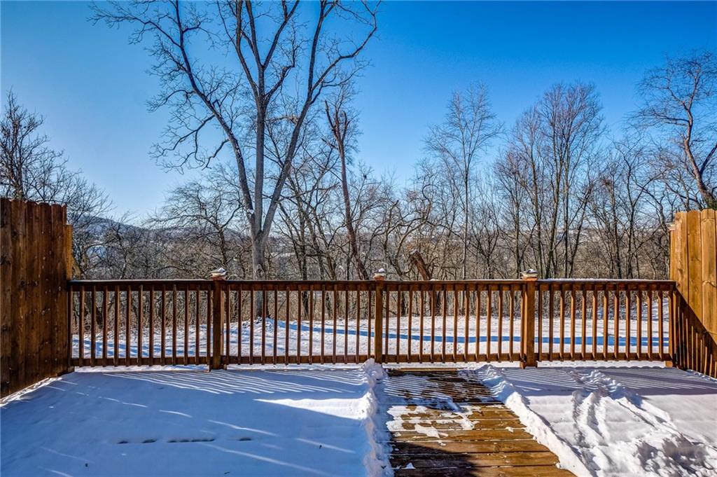 110 Maple Ridge Court Canonsburg, PA 15317 - Photo 22 of 24 HUGE Deck with privacy panels looks out at the wooded backyard.